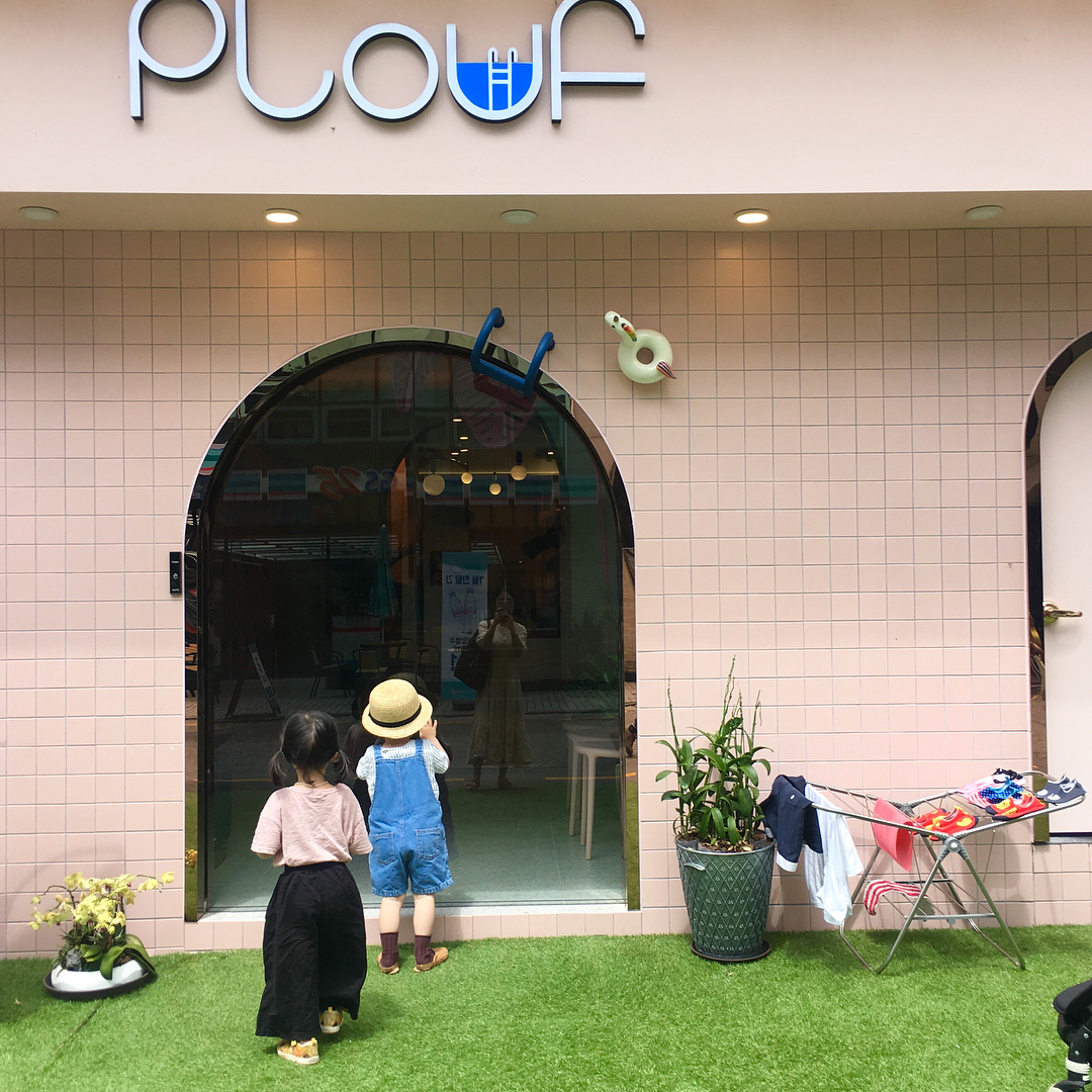 Plouf kids pool cafe in Cheongdam Seoul with a pastel pink interior and a small indoor pool for children